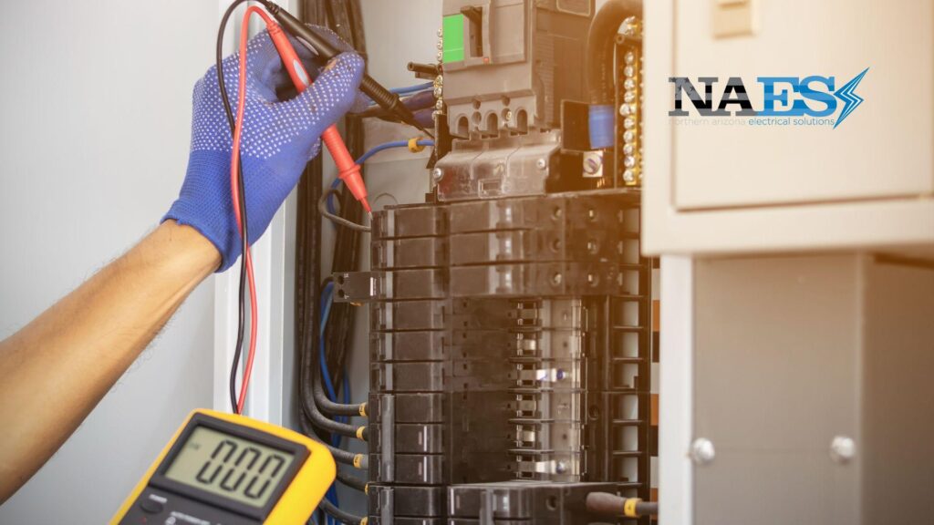 Northern Arizona Electrical Solutions technician testing an electrical panel with a multimeter to ensure safe and reliable power.