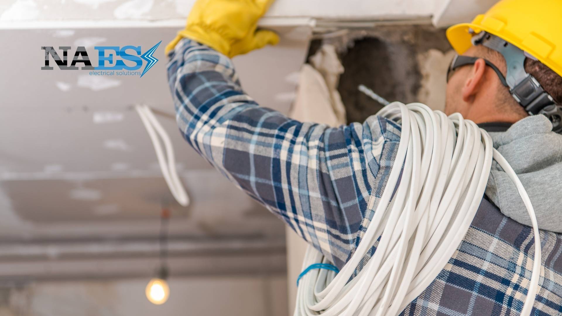 Home interior with walls opened showing outdated electrical circuits being safely removed and replaced as part of a complete house rewiring service in Northern Arizona.